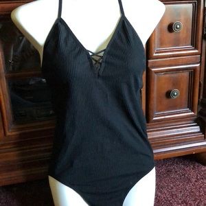 Sexy cross cross black rubbed body suit
